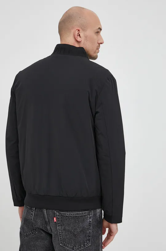 Куртка-бомбер Calvin Klein  Основний матеріал: 87% Нейлон, 13% Еластан Підкладка: 100% Поліестер Наповнювач: 100% Поліестер Резинка: 97% Поліестер, 3% Еластан
