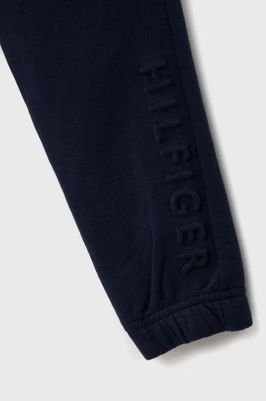 Detské nohavice Tommy Hilfiger  Základná látka: 87% Bavlna, 13% Polyester Elastická manžeta: 95% Bavlna, 5% Elastan