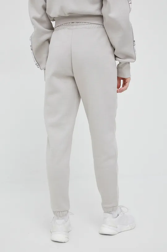 Reebok spodnie dresowe HA5733 Materiał zasadniczy: 70 % Bawełna, 30 % Poliester, Podszewka kieszeni: 100 % Bawełna