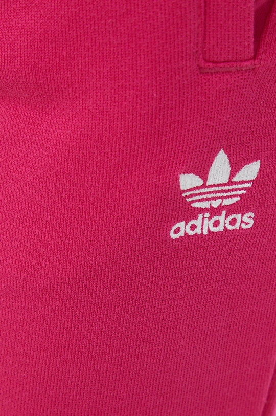 рожевий Бавовняні спортивні штани adidas Originals Adicolor