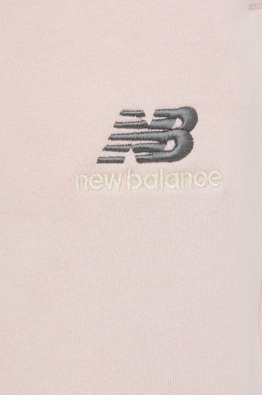 różowy New Balance spodnie dresowe UP21500PIE