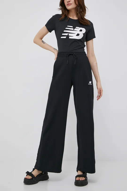New Balance spodnie WP21502BK czarny