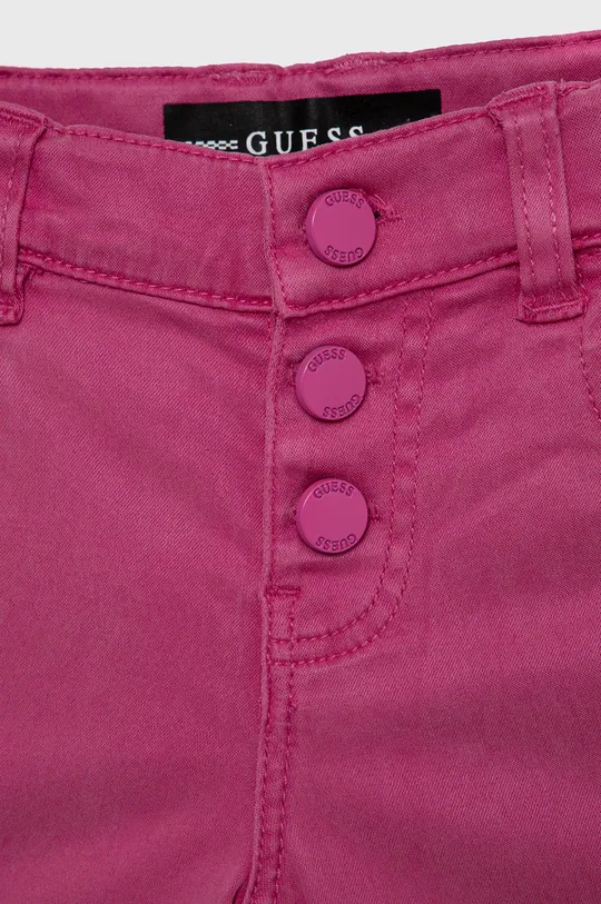 Παιδικό παντελόνι Guess  Κύριο υλικό: 39% Βαμβάκι, 4% Σπαντέξ, 57% Lyocell Φόδρα τσέπης: 100% Βαμβάκι