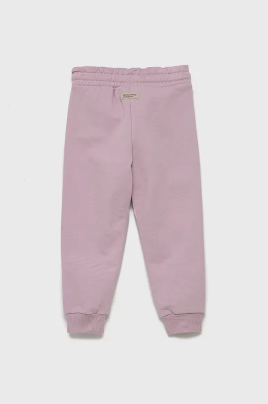 Детские хлопковые брюки United Colors of Benetton розовый