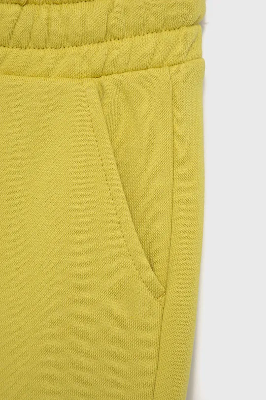 Dječje pamučne hlače United Colors of Benetton  Temeljni materijal: 100% Pamuk Umeci: 95% Pamuk, 5% Elastan