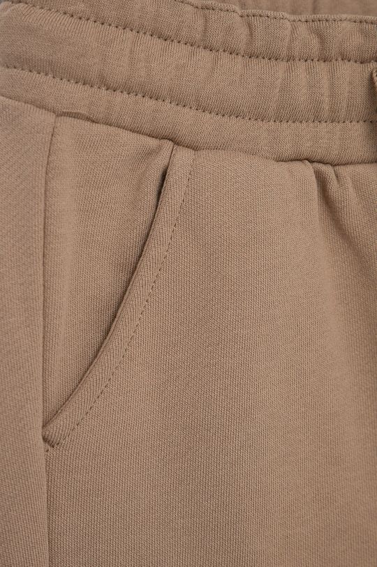 Dětské bavlněné kalhoty United Colors of Benetton  Hlavní materiál: 100% Bavlna Ozdobné prvky: 95% Bavlna, 5% Elastan