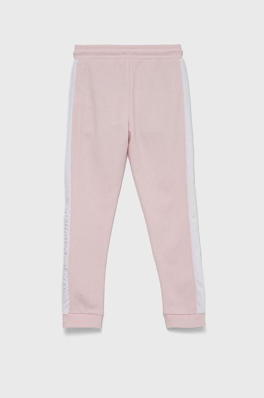 Detské nohavice Calvin Klein Jeans pastelová ružová