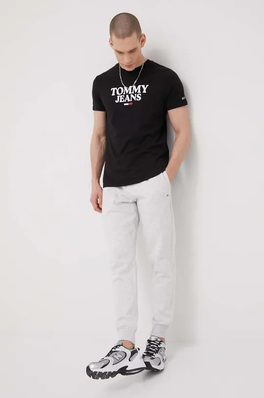 Nohavice Tommy Jeans sivá