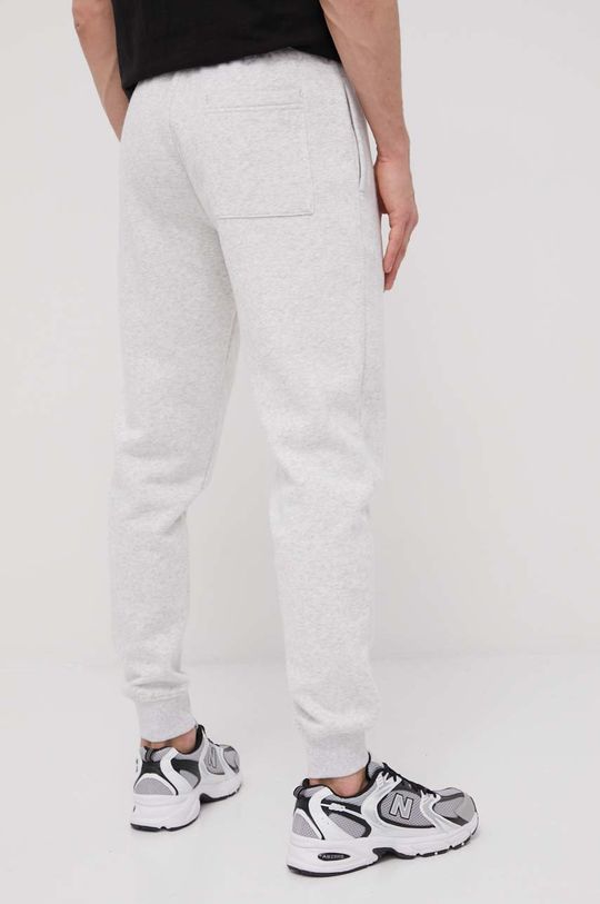 Kalhoty Tommy Jeans  Hlavní materiál: 70% Bavlna, 30% Polyester Stahovák: 95% Bavlna, 5% Elastan