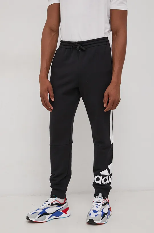 črna Hlače adidas Moški