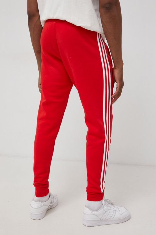 czerwony adidas Originals Spodnie