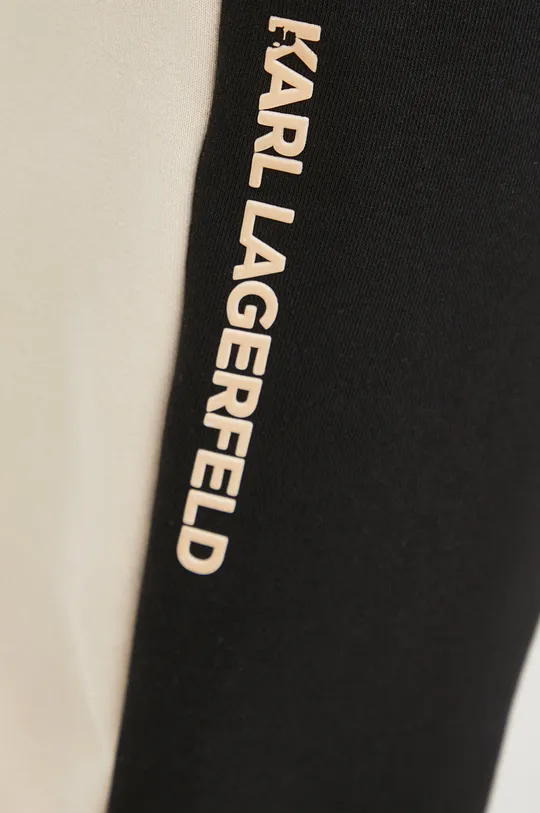Tepláky Karl Lagerfeld  Základná látka: 87 % Bavlna, 13 % Polyester Podšívka vrecka: 100 % Bavlna