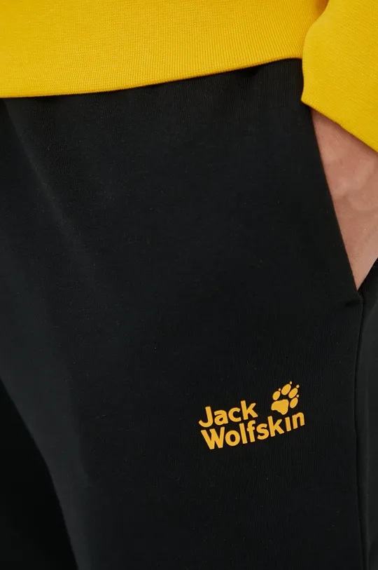 crna Pamučni donji dio trenirke Jack Wolfskin