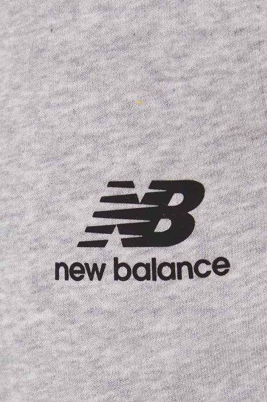 světle šedá Tepláky New Balance MP21503AG