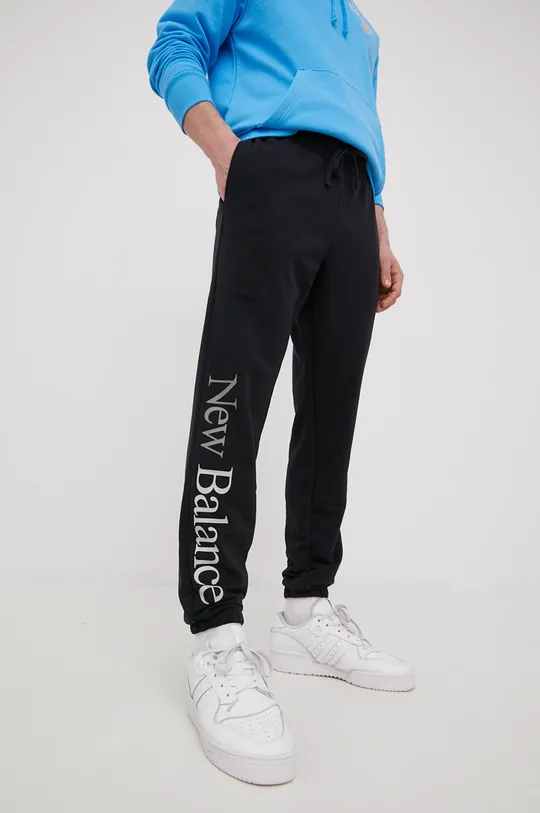 czarny New Balance spodnie dresowe MP21503BK Męski