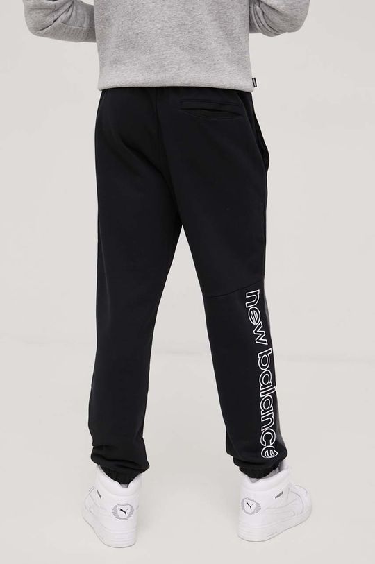 New Balance spodnie dresowe bawełniane MP21550BK 100 % Bawełna
