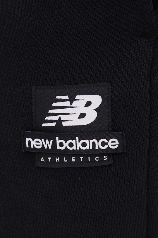czarny New Balance spodnie dresowe bawełniane MP21550BK