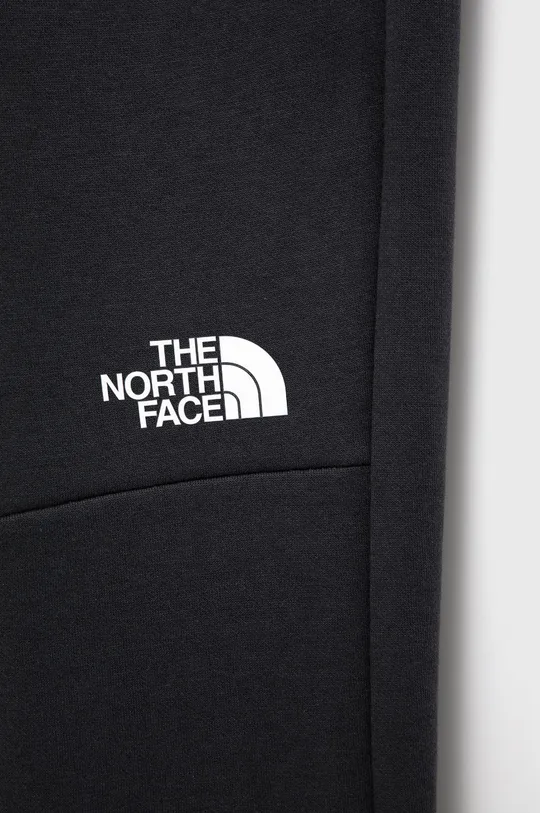 Детские брюки The North Face  Основной материал: 81% Хлопок, 19% Полиэстер Подкладка кармана: 100% Полиэстер