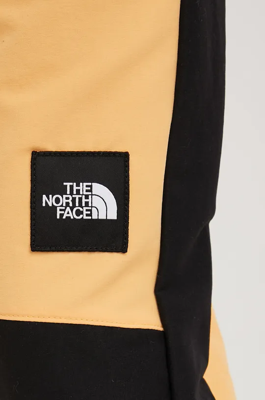 pomarańczowy The North Face spodnie dresowe Black Box