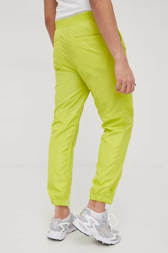 Tepláky Calvin Klein Jeans  Podšívka: 100% Polyester Základná látka: 100% Polyamid