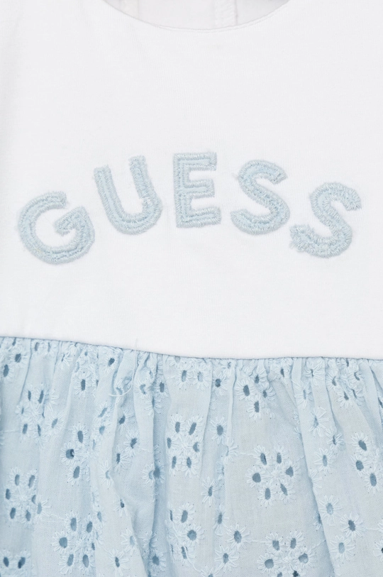 Παιδικό φόρεμα Guess  Άλλα υλικά: 100% Πολυεστέρας Υλικό 1: 95% Βαμβάκι, 5% Σπαντέξ Υλικό 2: 100% Βαμβάκι