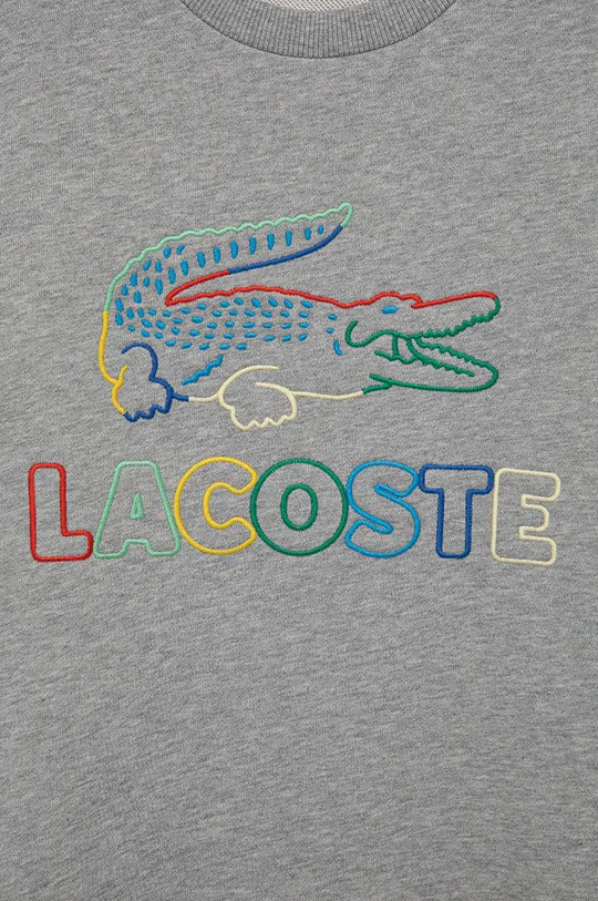 Παιδική βαμβακερή μπλούζα Lacoste  Κύριο υλικό: 100% Βαμβάκι Πλέξη Λαστιχο: 98% Βαμβάκι, 2% Σπαντέξ