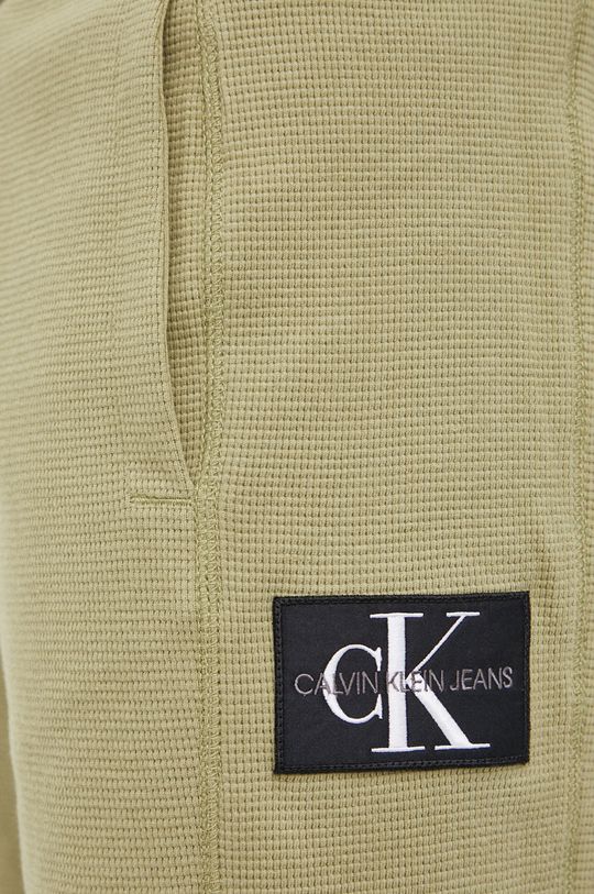 svetlá olivová Bavlnené šortky Calvin Klein Jeans
