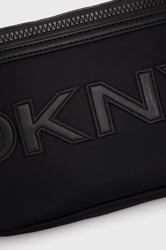 Τσάντα φάκελος DKNY  Κύριο υλικό: 100% Νάιλον Φινίρισμα: 100% Poliuretan