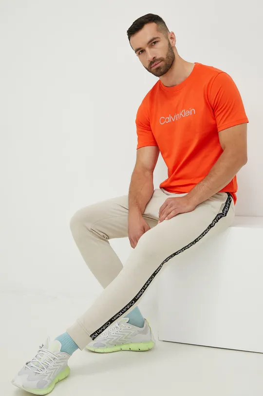 Μπλουζάκι προπόνησης Calvin Klein Performance Ck Essentials πορτοκαλί