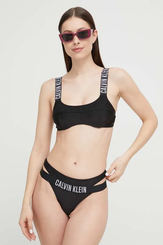 Calvin Klein bikini felső  Jelentős anyag: 85% poliamid, 15% elasztán Bélés: 92% poliészter, 8% elasztán