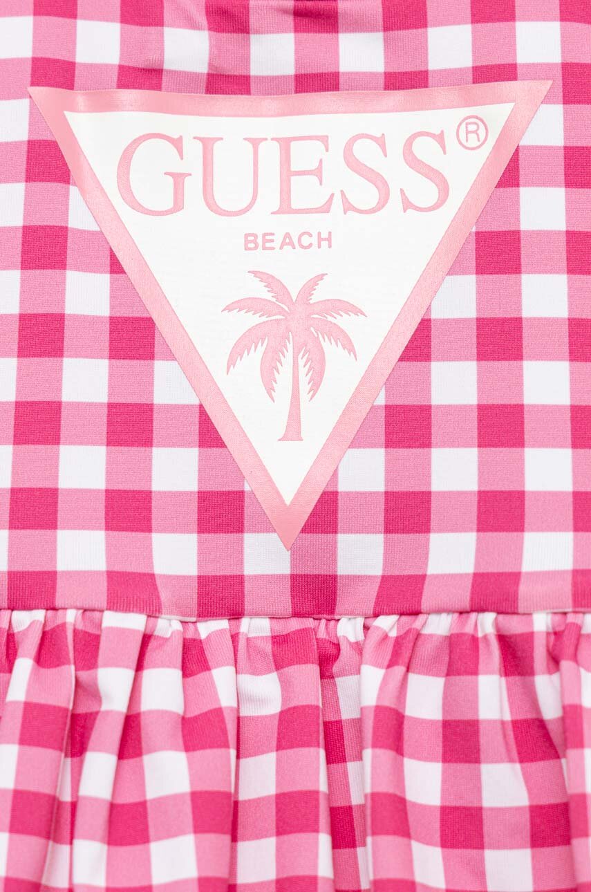 Суцільний дитячий купальник Guess  Основний матеріал: 85% Поліамід, 15% Еластан Підкладка: 89% Поліестер, 11% Еластан