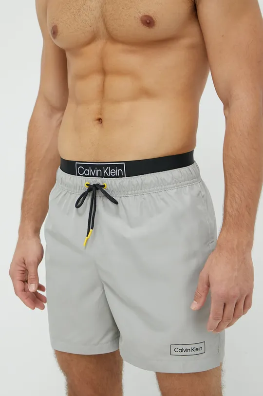 Plavkové šortky Calvin Klein sivá