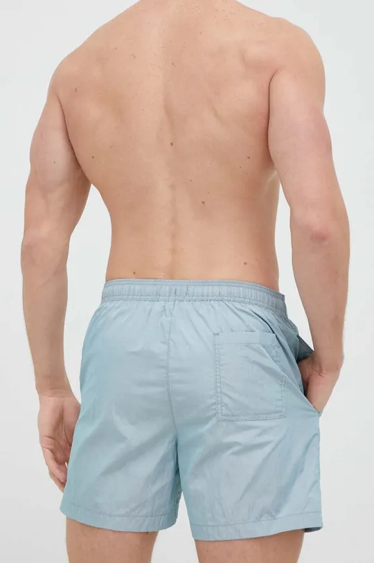 Kopalne kratke hlače Calvin Klein  Glavni material: 60 % Poliester, 40 % Poliamid Podloga: 100 % Poliester