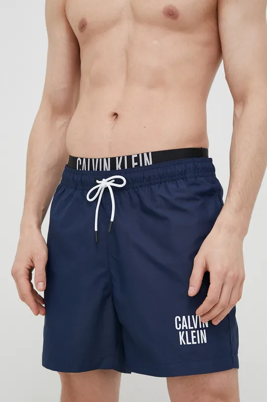 Plavkové šortky Calvin Klein tmavomodrá