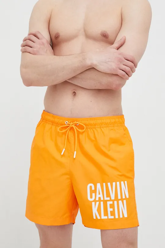Plavkové šortky Calvin Klein oranžová