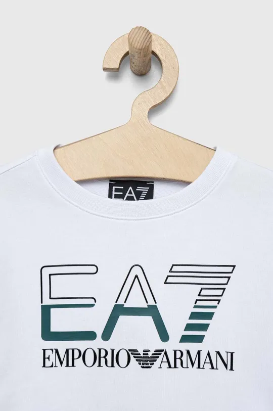 Παιδική βαμβακερή μπλούζα EA7 Emporio Armani  Κύριο υλικό: 100% Βαμβάκι Πλέξη Λαστιχο: 95% Βαμβάκι, 5% Σπαντέξ