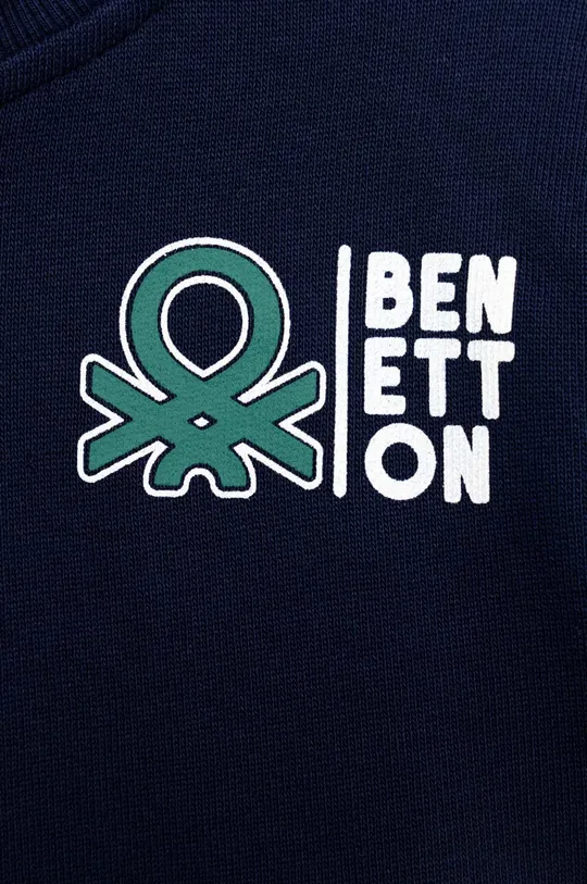 Παιδική βαμβακερή μπλούζα United Colors of Benetton  Κύριο υλικό: 100% Βαμβάκι Προσθήκη: 95% Βαμβάκι, 5% Σπαντέξ