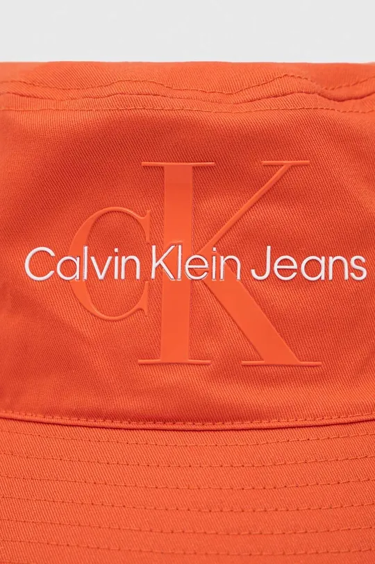 Bombažni klobuk Calvin Klein Jeans oranžna