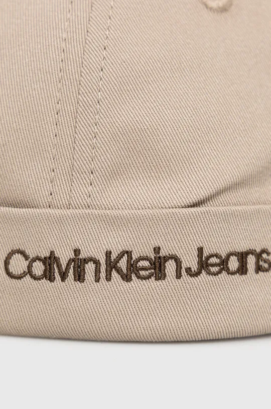 Дитяча бавовняна шапка Calvin Klein Jeans бежевий