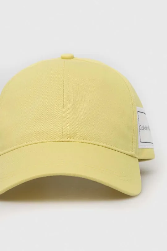 Βαμβακερό καπέλο του μπέιζμπολ Calvin Klein κίτρινο