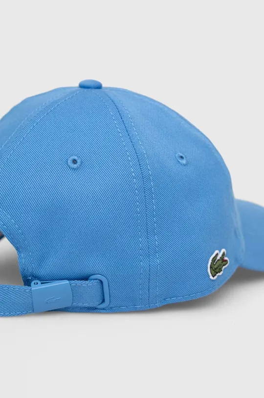 Bombažna bejzbolska kapa Lacoste modra