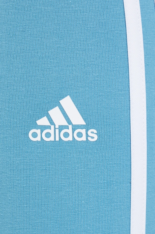 блакитний Легінси adidas