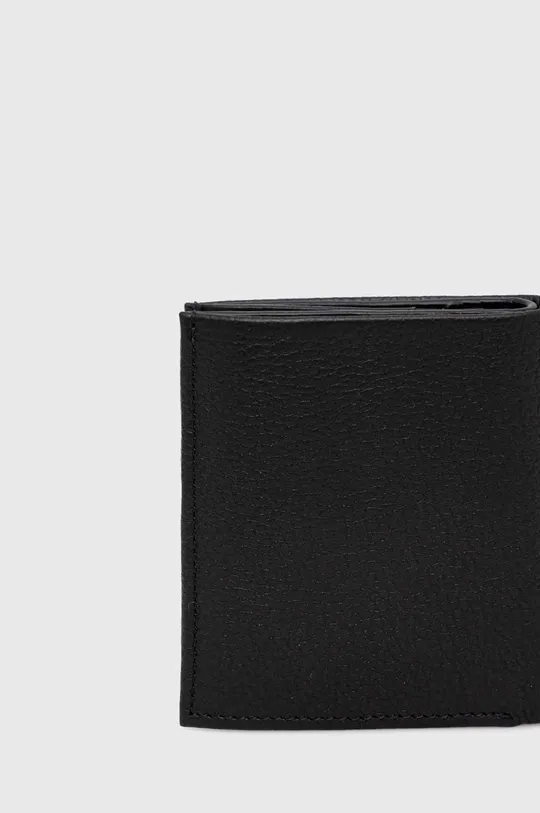 Usnjena denarnica Calvin Klein  Glavni material: 100% Naravno usnje Podloga: 100% Recikliran poliester