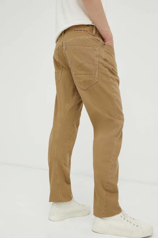 Хлопковые брюки G-Star Raw  Основной материал: 75% Хлопок, 25% Переработанный хлопок Подкладка кармана: 65% Переработанный полиэстер, 35% Органический хлопок