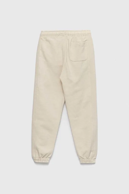Детские хлопковые штаны Calvin Klein Jeans бежевый