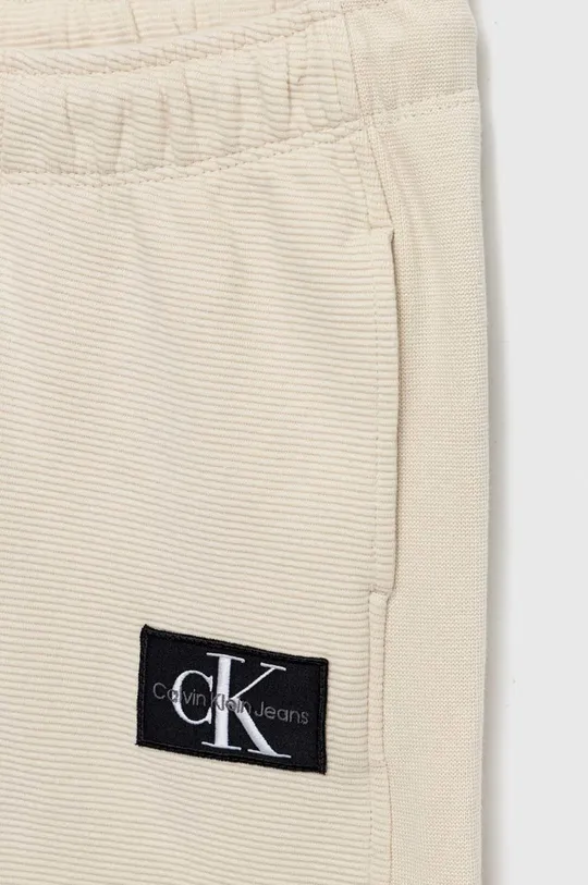 Παιδικό βαμβακερό παντελόνι Calvin Klein Jeans  Κύριο υλικό: 100% Βαμβάκι Πλέξη Λαστιχο: 95% Βαμβάκι, 5% Σπαντέξ
