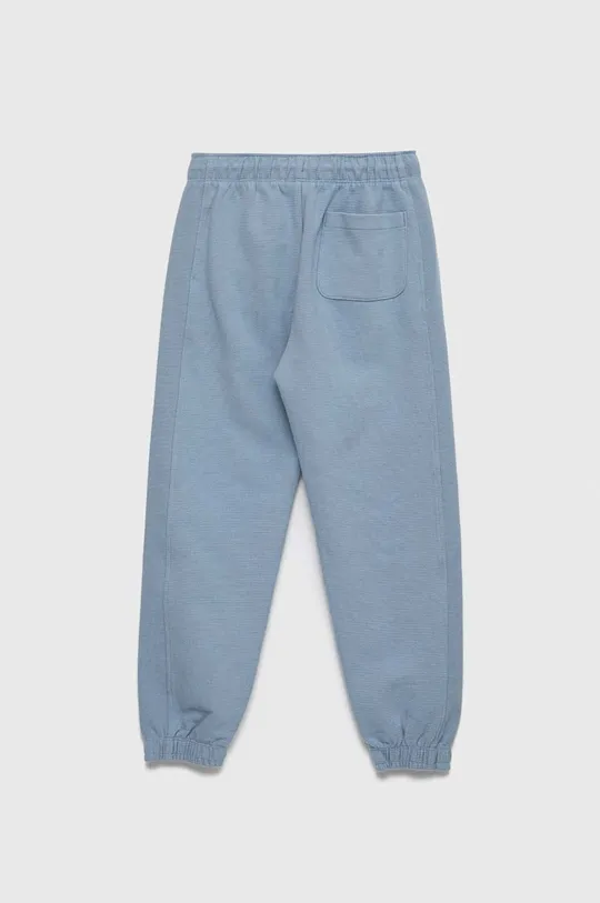 Detské bavlnené tepláky Calvin Klein Jeans modrá