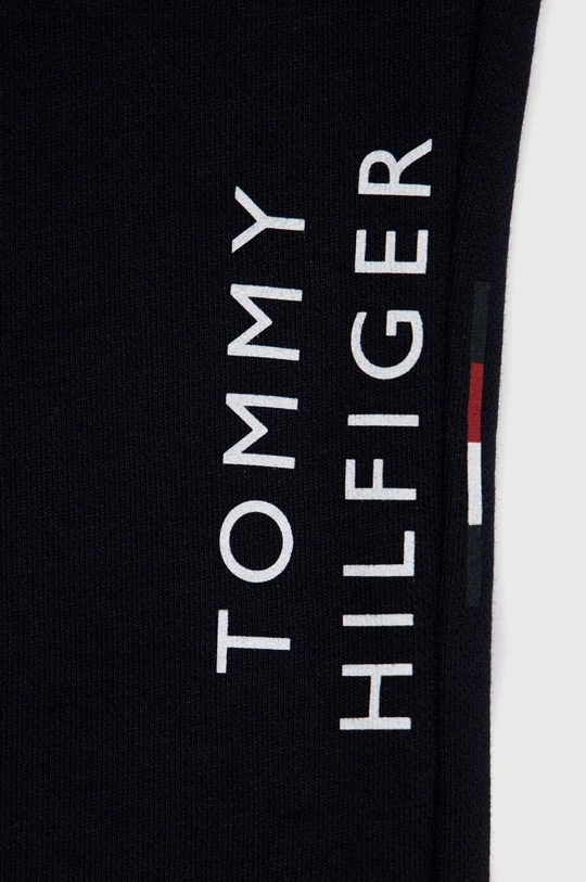 Dječji donji dio trenirke Tommy Hilfiger  Temeljni materijal: 88% Pamuk, 12% Poliester Manžeta: 95% Pamuk, 5% Elastan