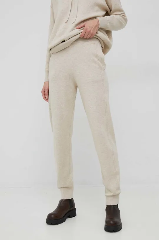beżowy Calvin Klein spodnie dresowe z domieszką wełny Damski