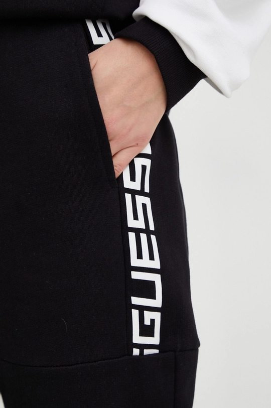 μαύρο Βαμβακερό παντελόνι Guess